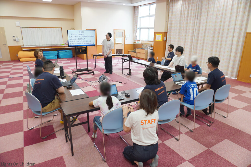 パソつか：愛泉寮との実施 2026年度第１回 子どもたちがペアのスタッフの力を借りて集中力を取り戻しました